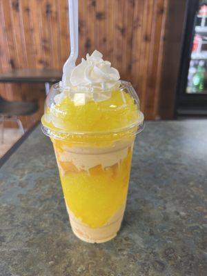 Knock out with piña colada shaved ice and mango ice cream