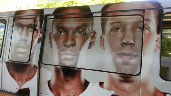 HEAT is on !  Tram cars decorated with Miami Heat players.