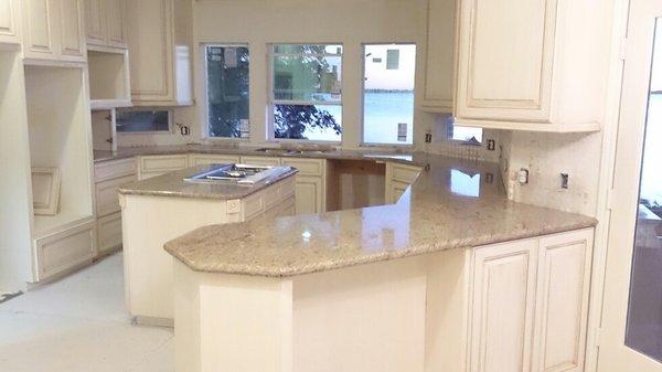 Kitchen Remodel - Tan Cabinets with Granite Countertops