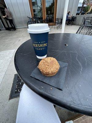 Large lavender coffee w/ oat milk on front patio