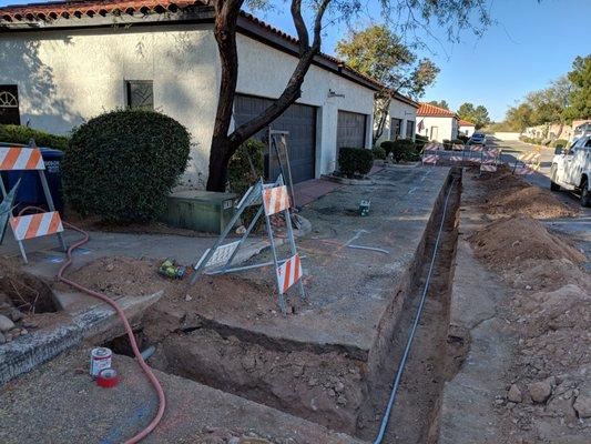 Replacing a line that powered the community lighting.