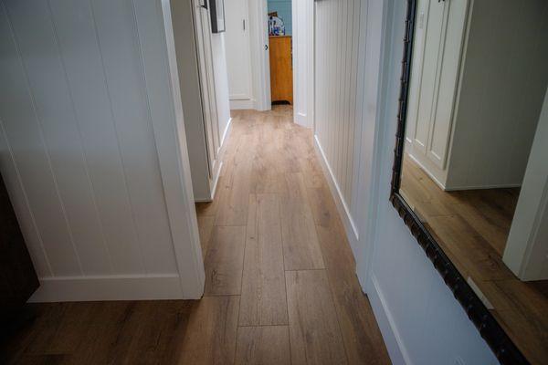 Our finish carpenter did all new base boards in 1 x5 alder wood...perfect match to the flooring size.