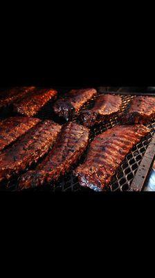 Slow smoked ribs and fall off the bone tender nobody's doing it we are