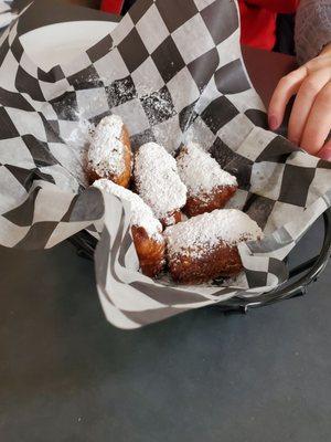 Beignets, excellent. The doughy inside and the crisp outside with powdered sugar is perfection.