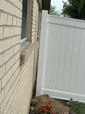 Gap between house and fence