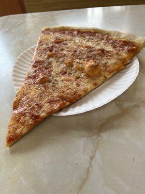 Large plain slice. Thin crispy crust.