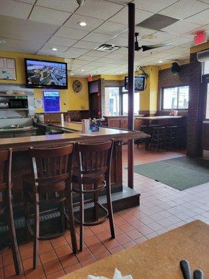 Bar with a fusbol table in the far corner