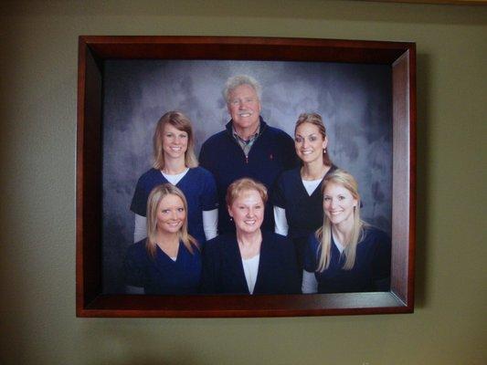 Photo of the staff - above the table with free coffee!