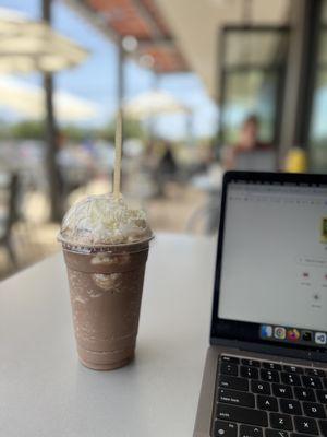 Blended Mocha sitting outside.