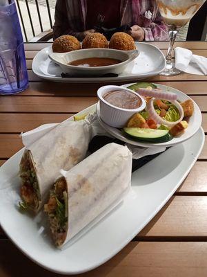 Foreground cajun shrimp wrap, rear sheperd's pie boxty.