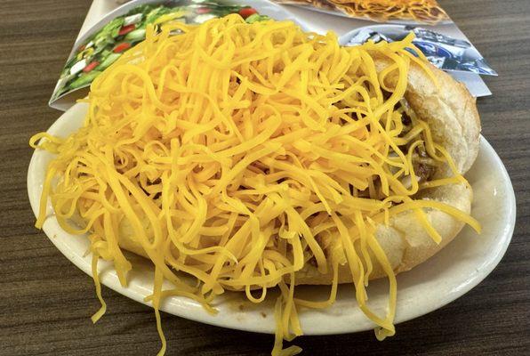 Coney Dog with mustard, onions, chili, and a mound of shredded cheese.  I wanted to eat about 18 of these!