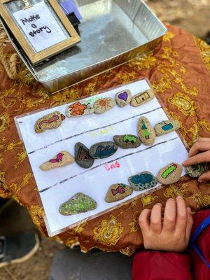 Story stones - a favorite activity where students use rock icons to create their own story, featuring a beginning, middle and end