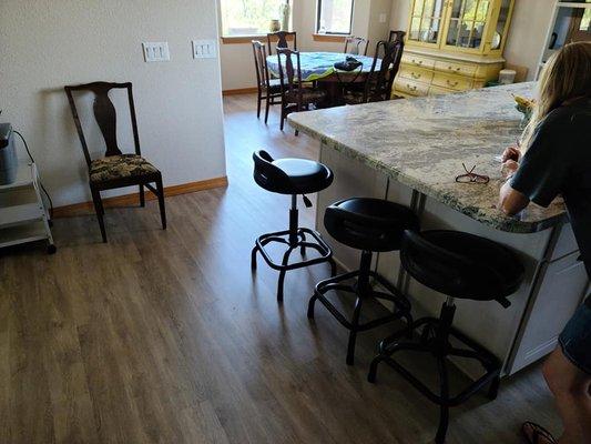 LVP floors throughout the kitchen, with Granite counter tops we installed.