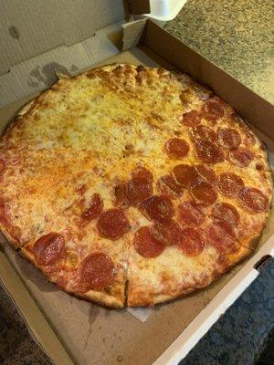 Large thin half pepperoni and half cheese pizza