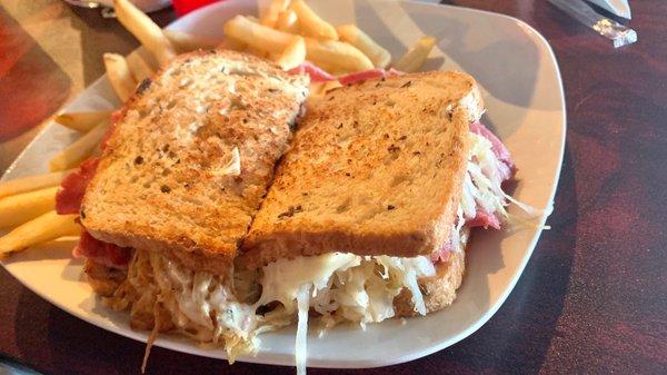 Reuben sandwich and french fries