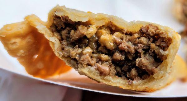 Two bites into the flavorful Carne Empanadilla (7/24/24)