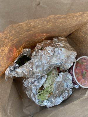 Everything leaking and exposed in take out bag!