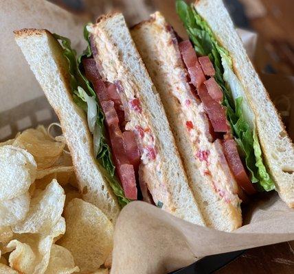 Spicy BLT, house made spicy pimiento cheese, crisp romaine, tomato served with kettle chips.