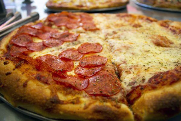 Come visit our pizza counter for a slice or two!