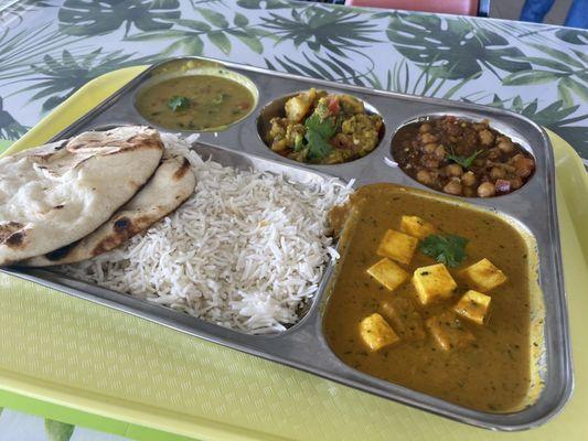 Thali with paneer curry. Everything was so good and fresh. Loved the cinnamon in the Chana and the naan was super fluffy.