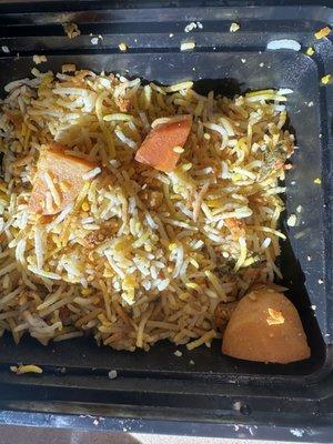 Veg Biryani - leftover rice with carrot chunks (and no other identifiable veggies)