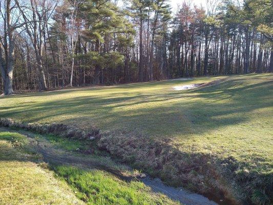 Little creeks can unexpectedly gobble up your golf ball if your not watching and referring to your scorecard.