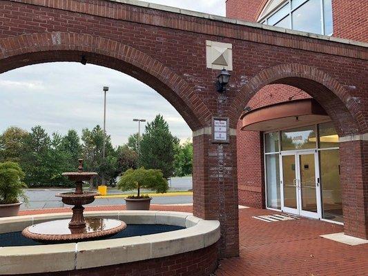 Entrance to the 2nd floor of building 44110 is located next to the fountain in the patio courtyard.