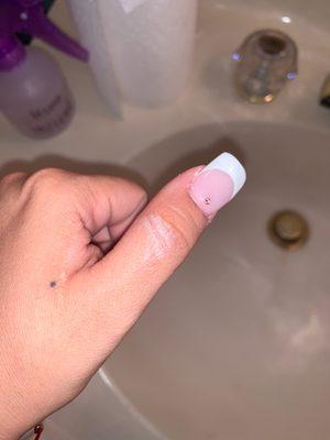 She left white nail polish on my skin