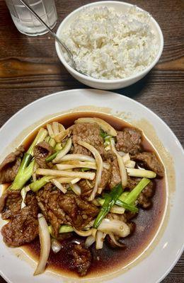 Mongolian beef with veggies and sticky rice.