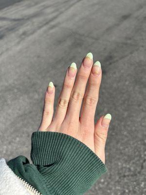 Light green French tip with gold stars