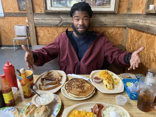 French toast biscuits and gravy, pancakes, omelette, and grits