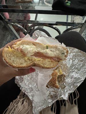 Lox, egg, scallion cream cheese on a toasted sesame bagel