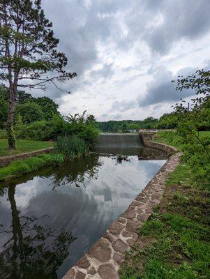 Small waterfall with landscaped waterway