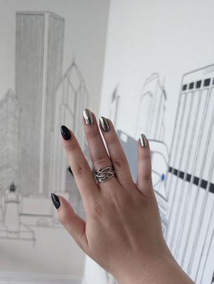 Gel black and chrome manicure on natural nails