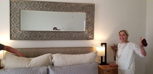 We secured this huge mirror to two studs for safety and customers peace of mind.