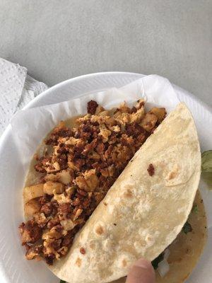 Egg chorizo and potato taco on flour