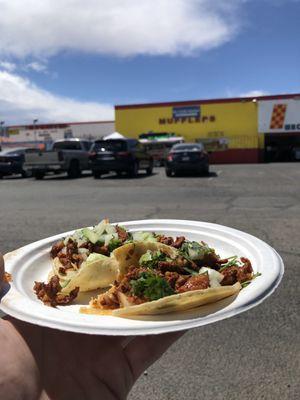 Tacos trailer next to Amigo Tire