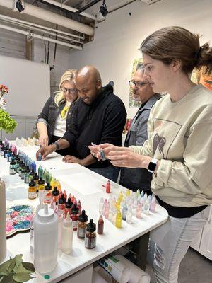 4 lovely people from a workshop at the color bar testing our colors to use for their paintings.