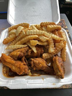 Honey Old Bay Wings and fries both fried hard/well done