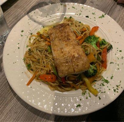 Orange Ginger Glazed Mahi-mahi served with a vegetable Lo-mein