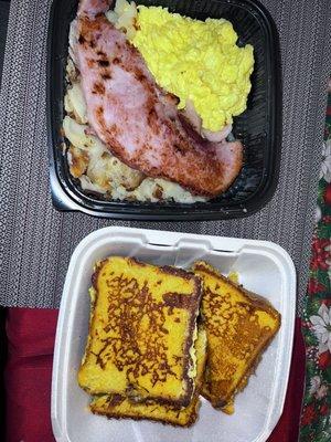 House special. Eggs  , ham, the most delicious hash brown potatoes you can get, and french toast. I ordered an extra side of french toast.