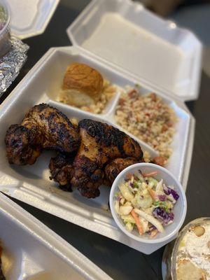 Jerk Chicken Special w/ dirty rice, coleslaw and roll $15