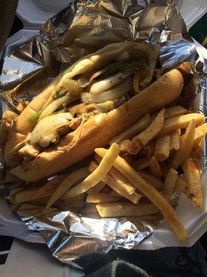 Jerk chicken Philly with seasoned fries