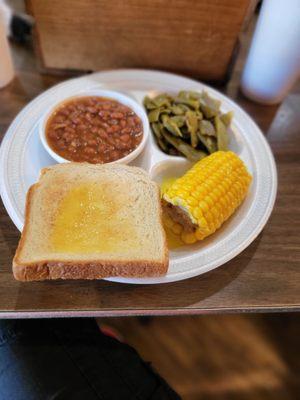 Veggie Plate with baked beans, green beans, and corn on the cob.