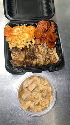 Baked jerk chicken, sweet potatoes, cabbage, Mac & cheese