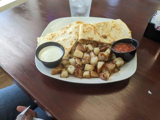 Chicken quesadilla with home fries fresh and plentiful