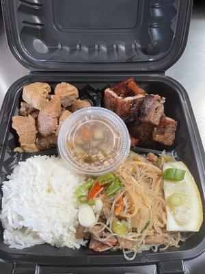 Two Entree's plate with pork adobo and grilled pork Liempo