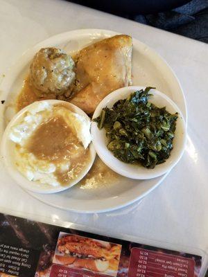 Baked chicken, mashed potatoes and gravy, greens and dressing