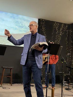 Pastor Mike presenting on a Sunday