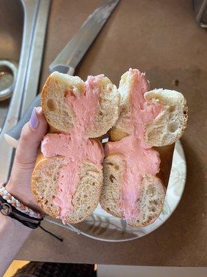 Plain bagel with strawberry cream cheese!